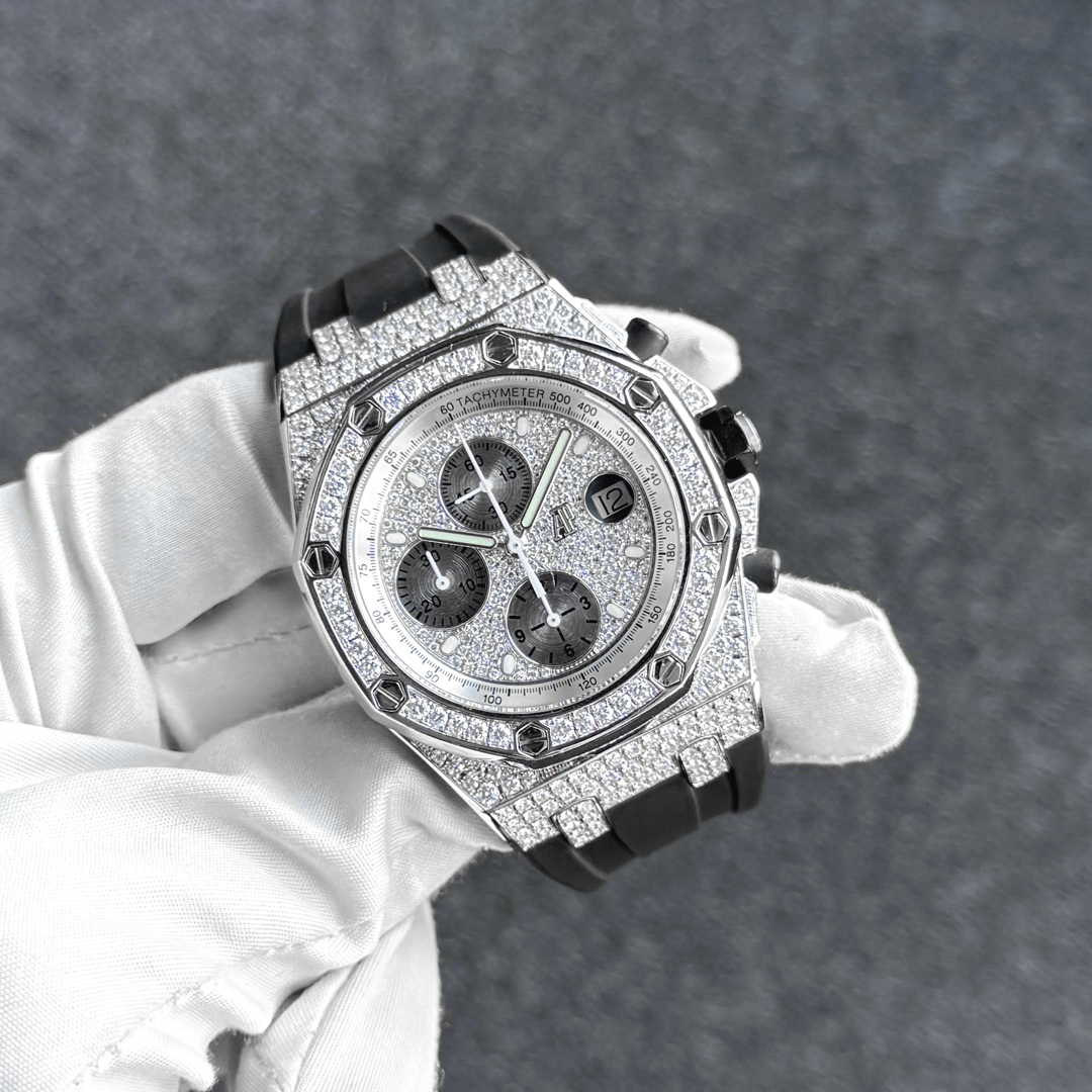 Audemars Piguet Royal Oak Offshore Chronograph white gold, full pave diamond custom, angled view with rubber strap