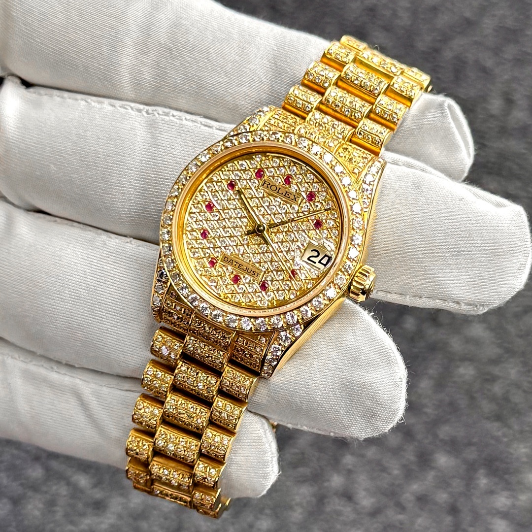 Rolex Datejust 68278 18K yellow gold full diamond custom, angled view showing bezel, case and bracelet.